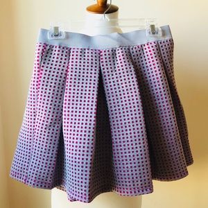 Romeo & Juliet Couture- Pleated. A line skirt